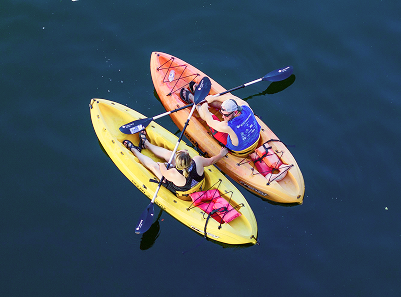two people in kayaks